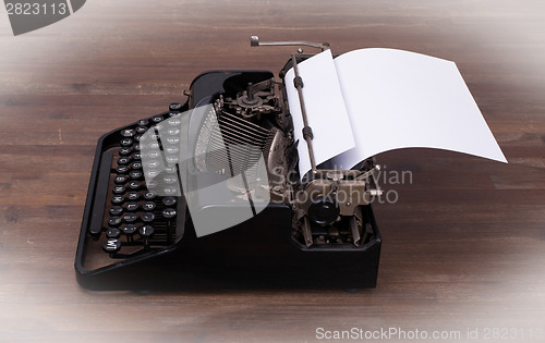 Image of Vintage typewriter and old books