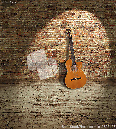Image of Guitar and wall