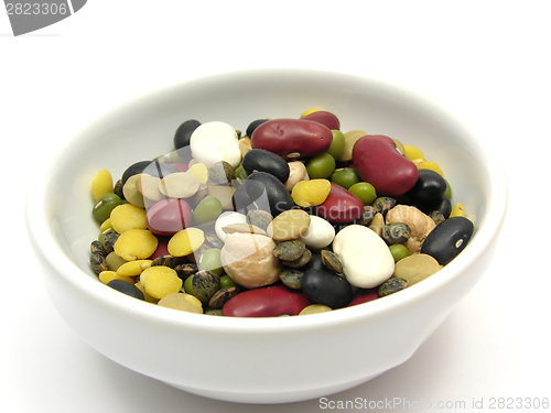 Image of A close-up view on mixed and colourful legumes in a bowl of chinaware