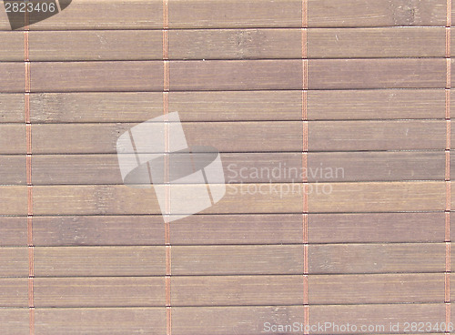 Image of Background out of dark brown wood tied up