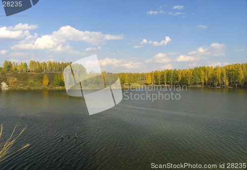 Image of Autumn view of lake and forest