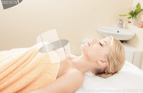 Image of beautiful woman in spa salon