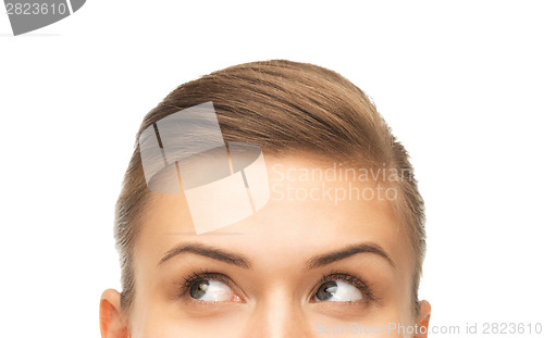 Image of close up of beautiful female eyes looking up