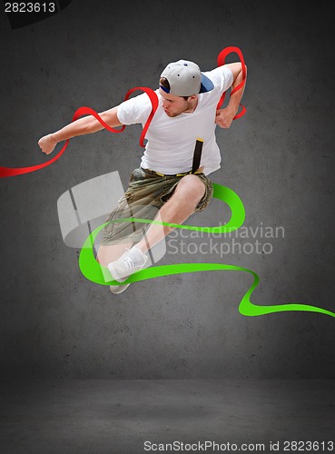 Image of male dancer jumping in the air