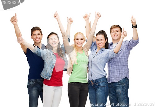 Image of group of smiling students showing thumbs up