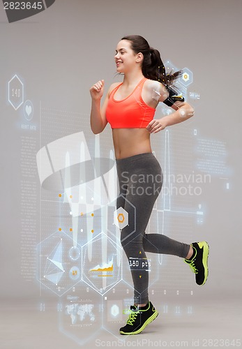 Image of sporty woman running or jumping