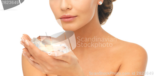 Image of woman showing big diamond