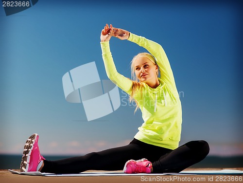 Image of woman doing sports outdoors