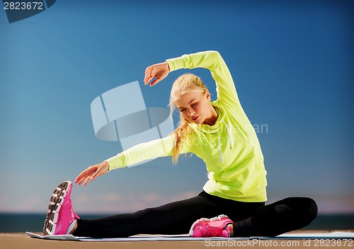 Image of woman doing sports outdoors