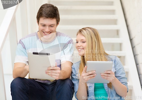 Image of smiling students with tablet pc computer
