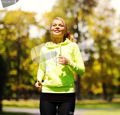 Image of woman jogging outdoors
