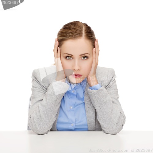 Image of stressed businesswoman