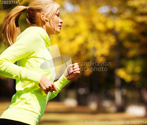 Image of woman doing running outdoors