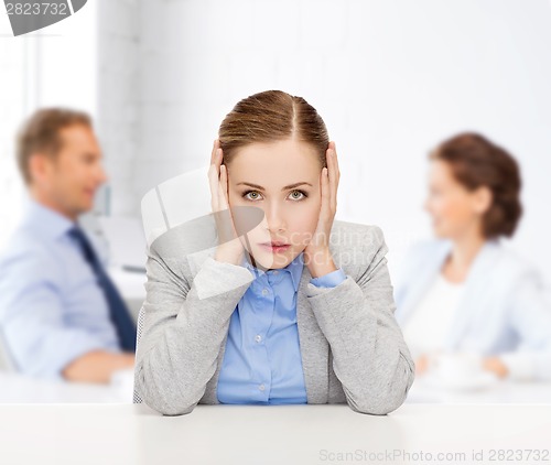 Image of stressed businesswoman