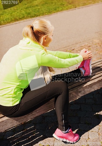 Image of woman doing sports outdoors