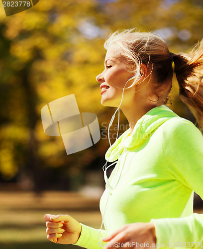 Image of woman doing running outdoors