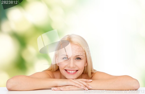 Image of clean face and shoulders of beautiful young woman