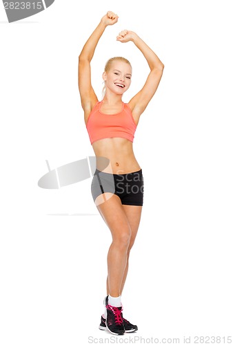 Image of beautiful sporty woman dancing