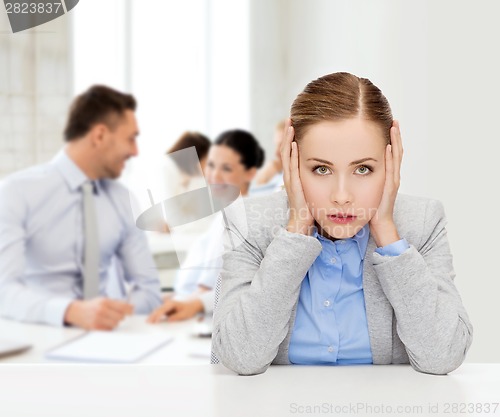 Image of stressed businesswoman