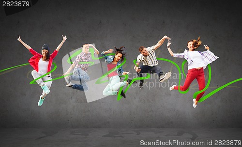 Image of group of teenagers jumping