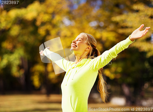 Image of woman doing sports outdoors