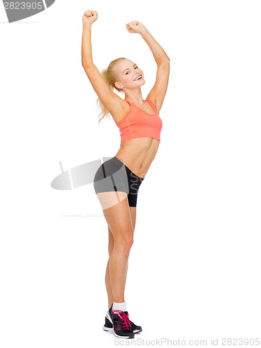 Image of beautiful sporty woman dancing