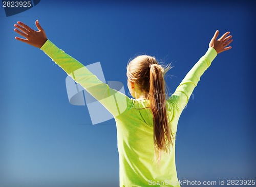 Image of woman doing sports outdoors