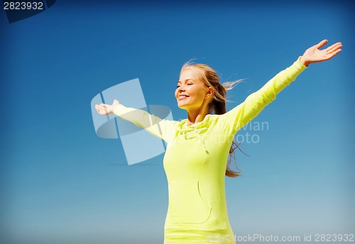 Image of woman doing sports outdoors