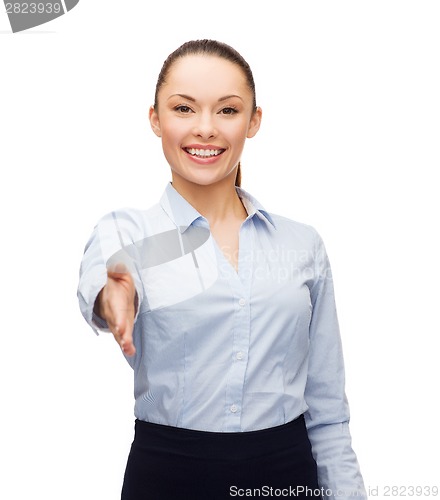 Image of businesswoman with opened hand ready for handshake