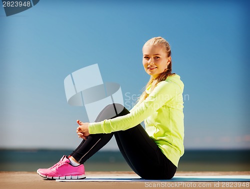 Image of woman doing sports outdoors