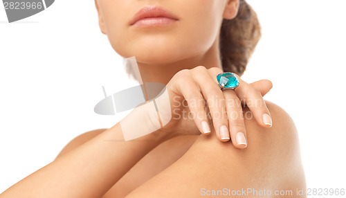 Image of woman with cocktail ring