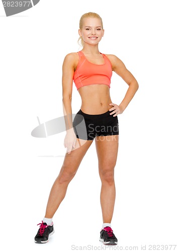 Image of beautiful athletic woman in sportswear