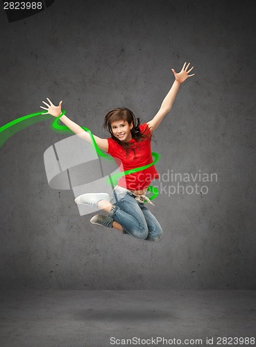 Image of happy jumping teenage girl