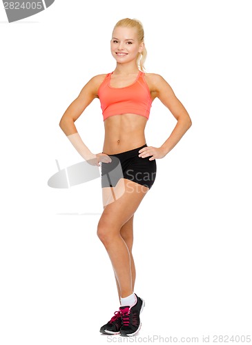 Image of beautiful athletic woman in sportswear