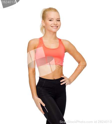 Image of beautiful athletic woman in sportswear