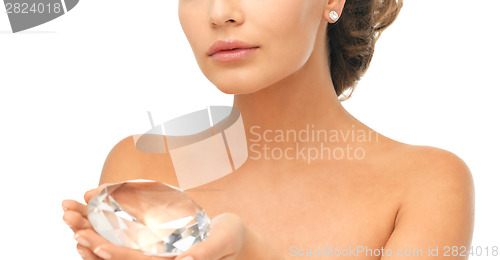 Image of woman showing big diamond