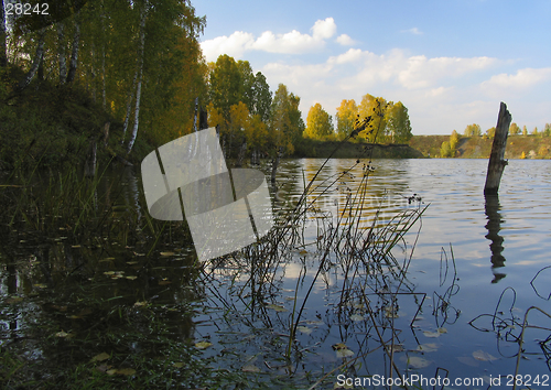 Image of Autumn view of lake and forest