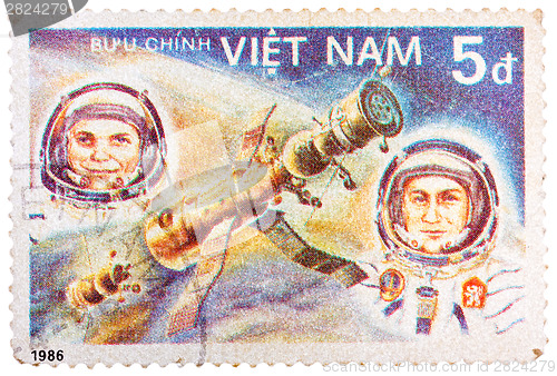 Image of Stamp printed in Vietnam shows vietnam cosmonaut Pham Tuan and s