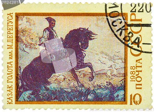 Image of Stamp printed in USSR shows the illustration by Deregus "Kozak G