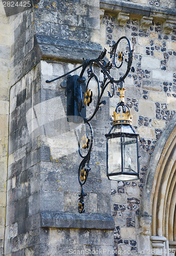 Image of Ornate lantern on a stone wall 