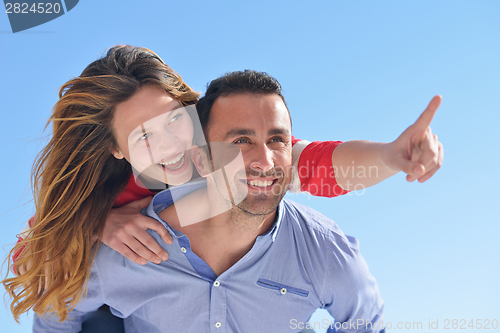 Image of happy young romantic couple have fun relax