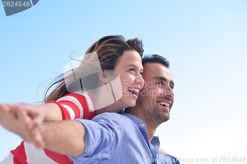 Image of happy young romantic couple have fun relax