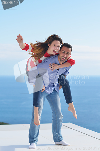 Image of happy young romantic couple have fun relax
