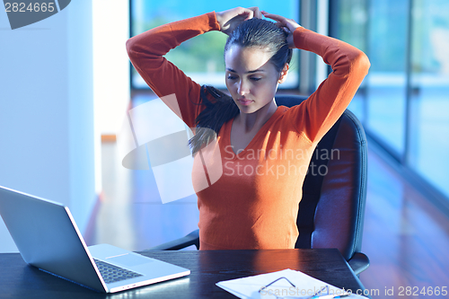 Image of relaxed young woman at home