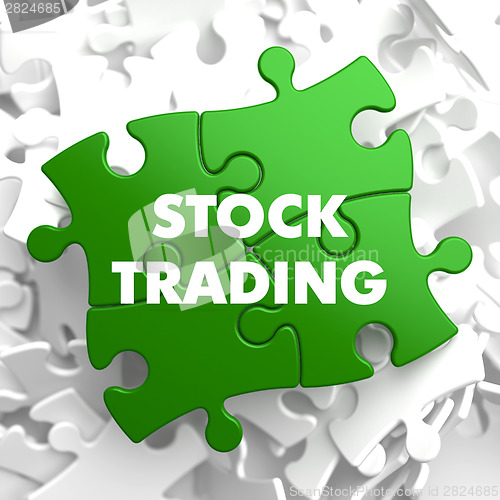Image of Stock Trading on Green Puzzle.