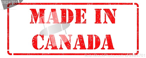 Image of Made in Canada - inscription on Red Rubber Stamp.