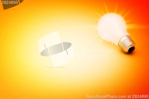 Image of Background with lit lightbulb