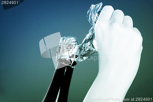 Image of Opening champagne bottle