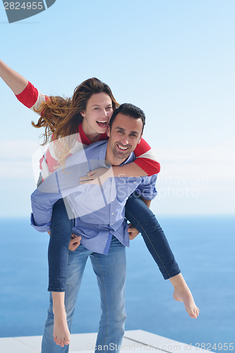 Image of happy young romantic couple have fun relax