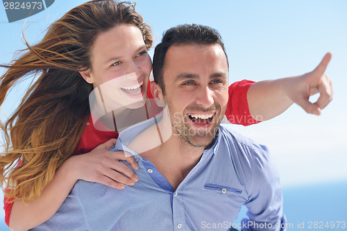 Image of happy young romantic couple have fun relax